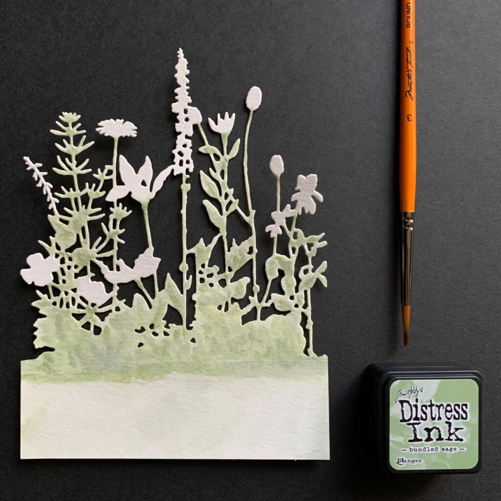 Watercoloring the wildflowers with green ink