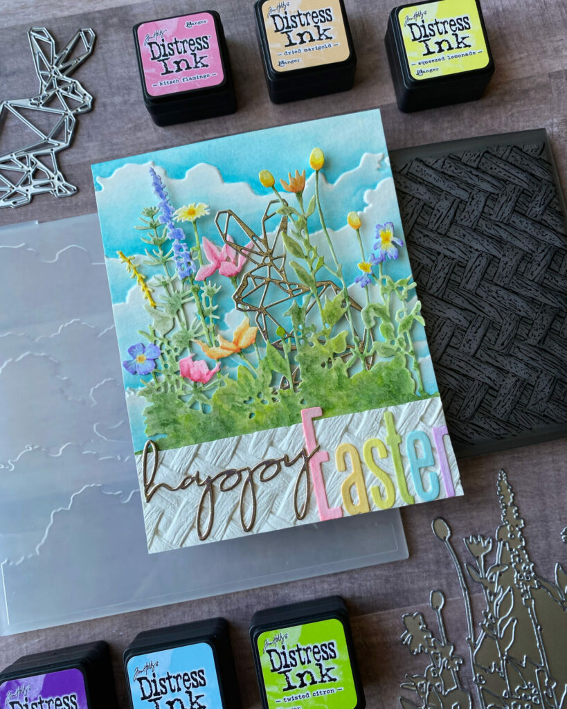 Easter wildflowers card surrounded by supplies