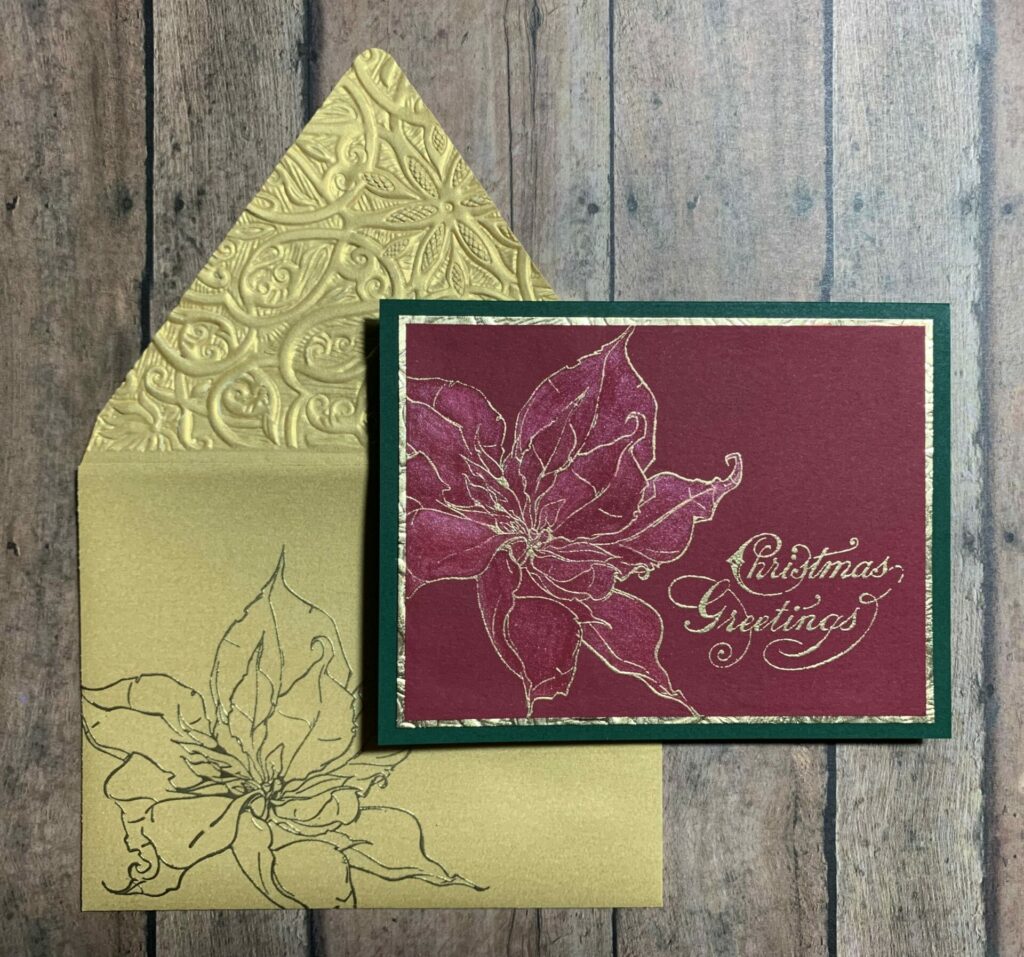 Poinsettia Christmas greetings card in traditional colors