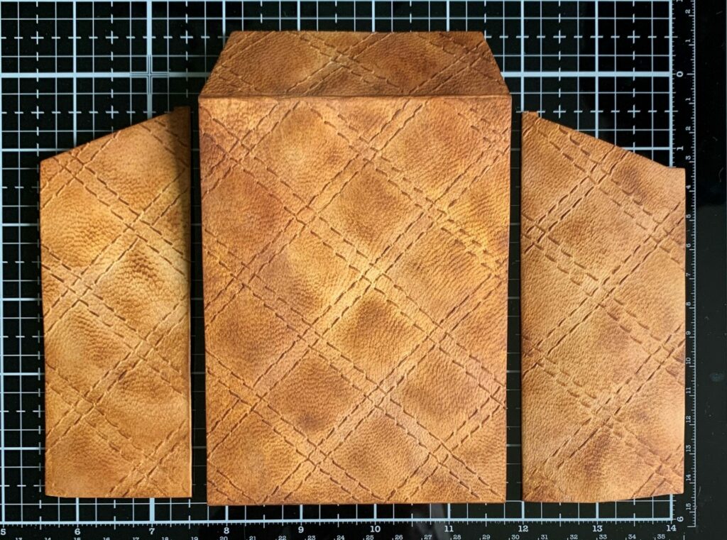 Inked embossed quilted leather envelope