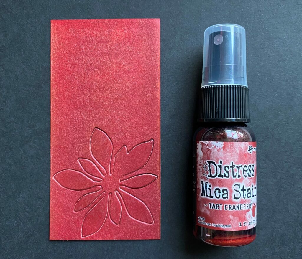 Flower die cut inked with tart cranberry distress mica stain
