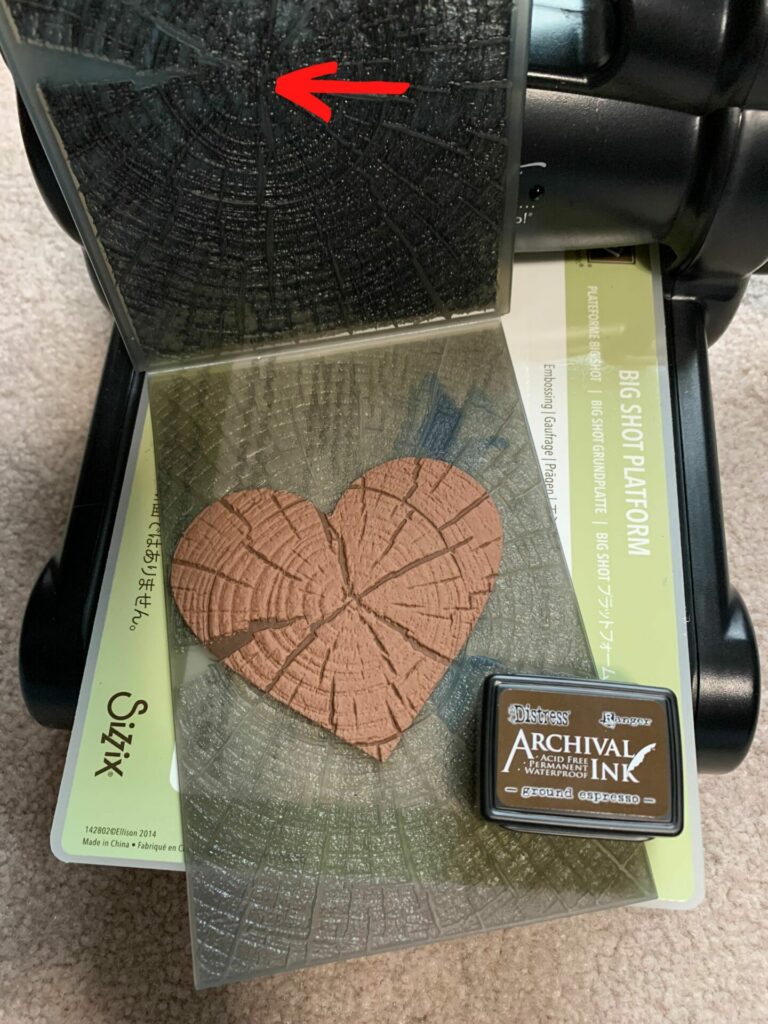 Embossing and inking the medium tree rings heart