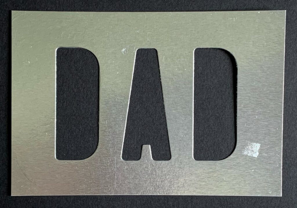 Die cut dad panel