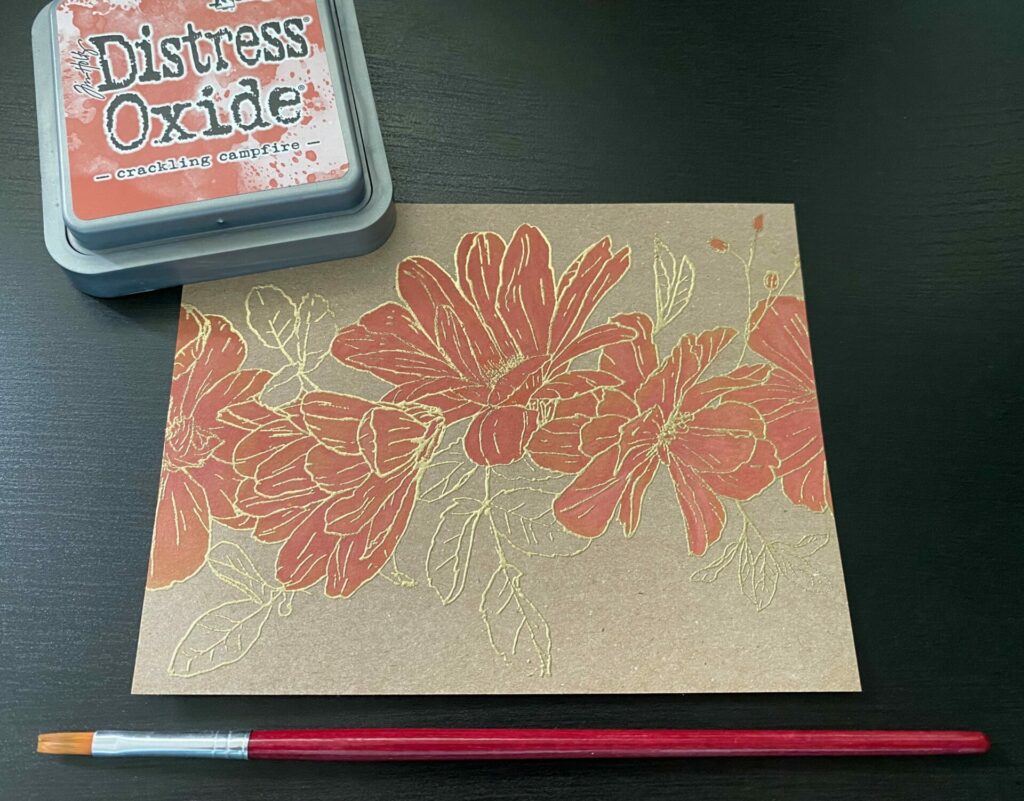 Water Coloring the flowers with orange oxide inks