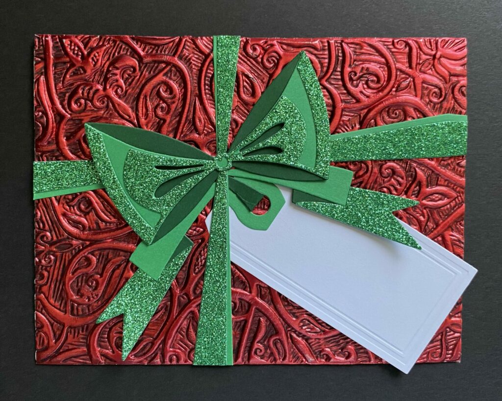 Attach the ribbon tails to the card.