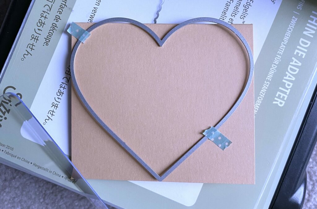 Cutting the heart shaped card base