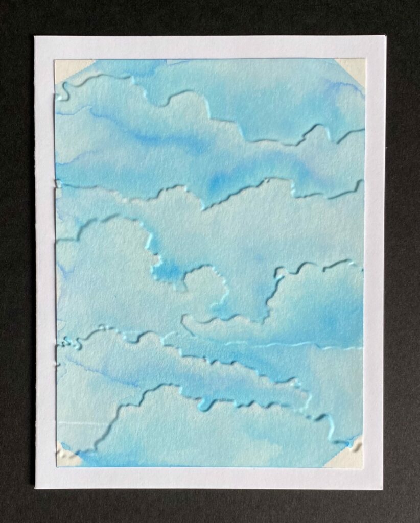 Cloud panel glued to card base