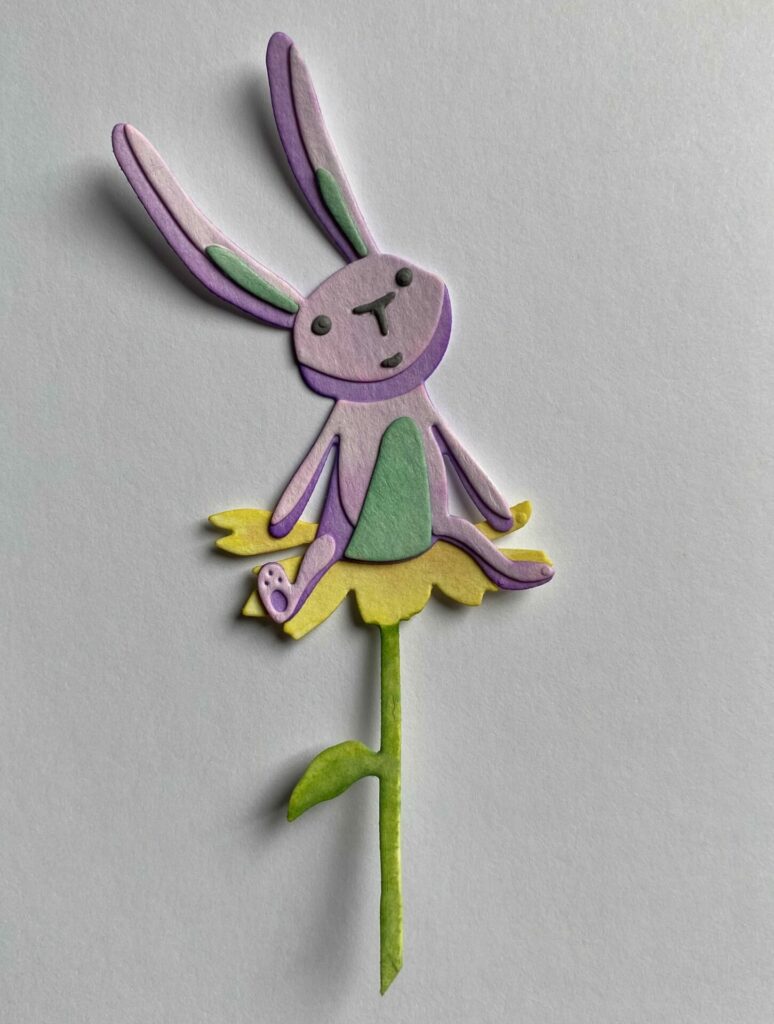 Bunny sitting on a flower