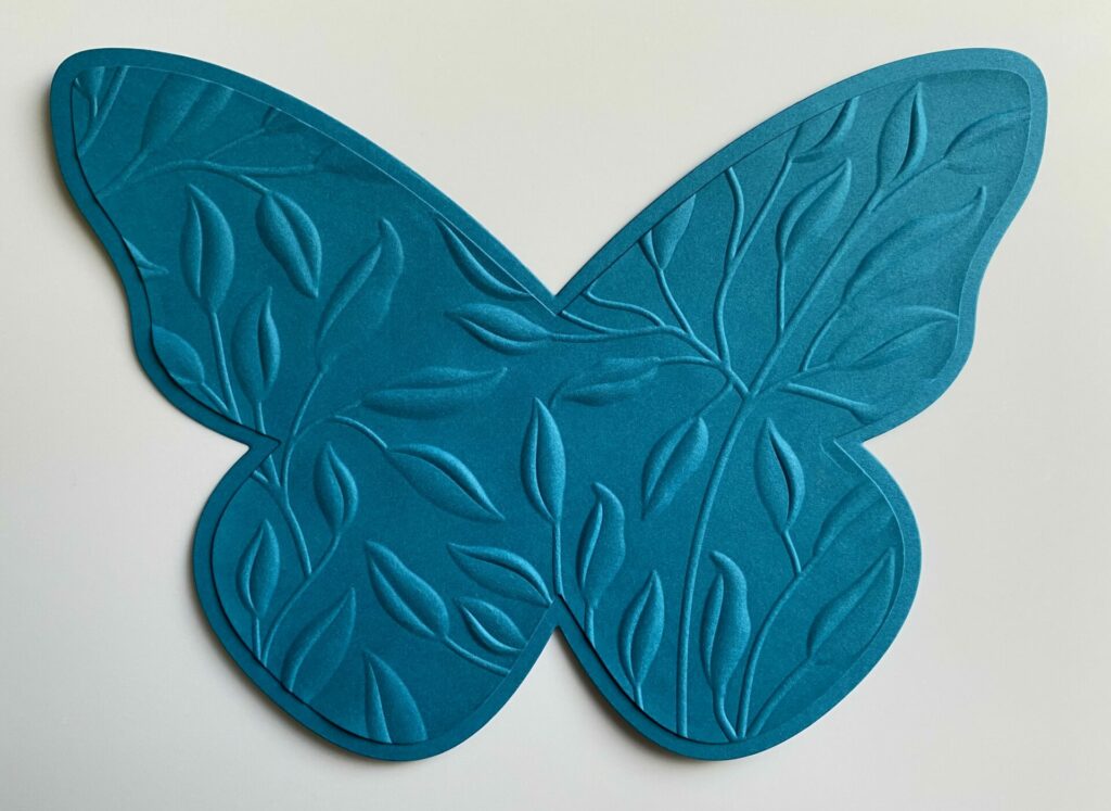 Floral butterfly shaped card front