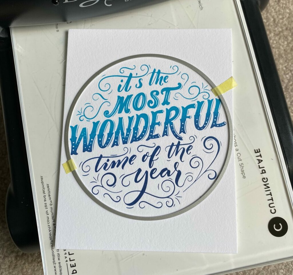 Die-cut the BetterPressed sentiment with a four inch circle die