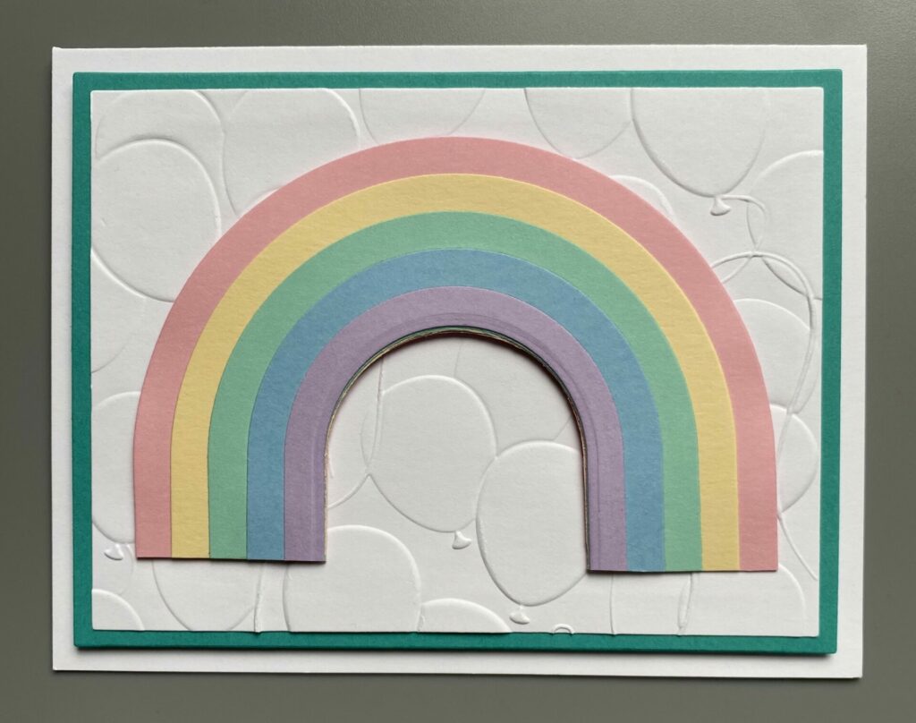 Add the rainbow to the card base