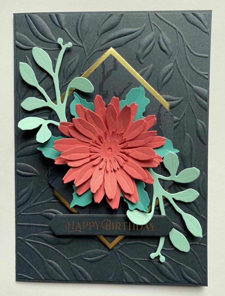 Attach the greenery to the card base