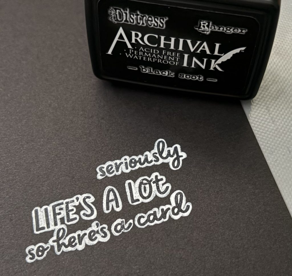 Stamp with black soot archival ink